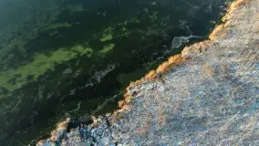 Zimowe Mazury z drona na różnych ujęciach - zdjęcie 9