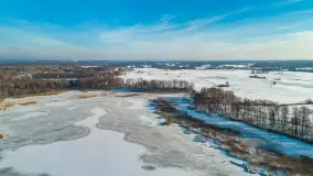 Dziewiszewo i jezioro Dziewiszewskie z lotu ptaka, styczeń 2024 r. - zdjęcie 1