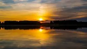 Zachód słońca, widok z wody na jezioro Święcajty - zdjęcie 2