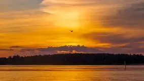 Zachód słońca, widok z wody na jezioro Święcajty - zdjęcie 17